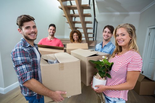 Moving boxes and furniture prepared for home moves in Richmonduponthames