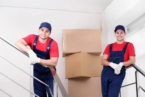 Removal team carefully loading household items in Richmond upon Thames
