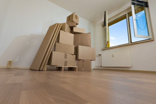 Local removal team packing and loading furniture
