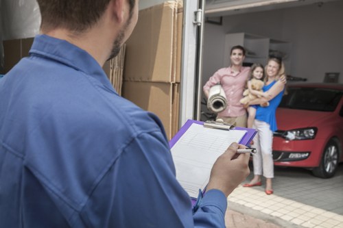 Organised moving service preparing boxes and equipment for transport